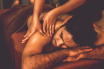 Kissenbezug Caucasian man customer enjoying relaxing anti-stress spa massage and pampering with beauty skin recreation leisure in warm candle lighting ambient salon spa at luxury resort or hotel. Quiescent © Summit Art Creations