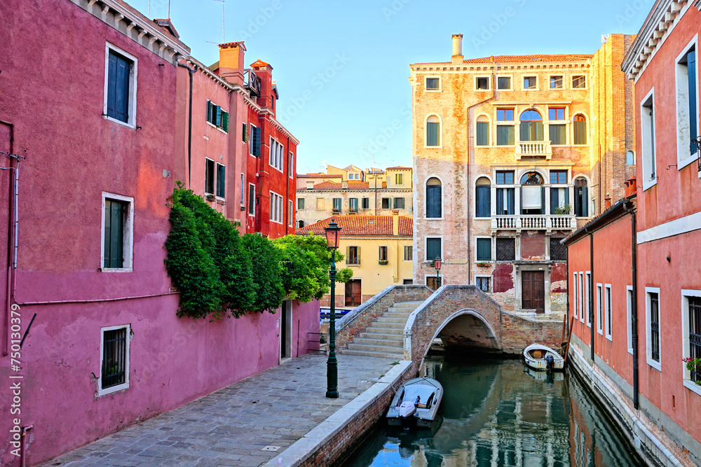 Canvas Prints colorful buildings and bridge lining the canals of the beautiful city of venice, italy at dusk