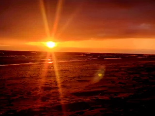 Fotobehang wschód słońca plaża bałtyk © Konrad