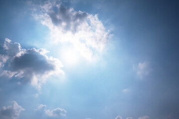 blue sky with white clouds sunray background
