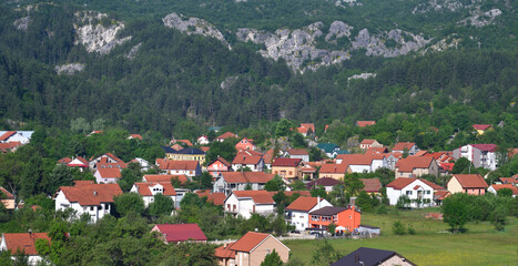Fototapeta na wymiar Typical village in Montenegro, houses with red roofs