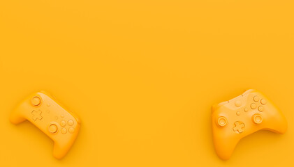 Video game joysticks or gamepads in plain monochrome yellow color background © Vasyl Onyskiv