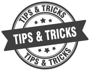 tips & tricks stamp. tips & tricks label on transparent background. round sign