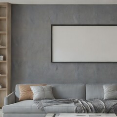 A contemporary living space with a stretch of gray sofa, a large blank framed art piece, and textured walls for a modern yet inviting look