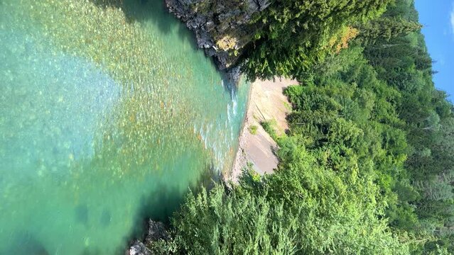 The Bolshaya Laba River. A mountain emerald river in a narrow, sunlit canyon. Bolshaya Laba River near the village of Psemen in Karachay-Cherkessia, Russia. Panoramic view. 4K