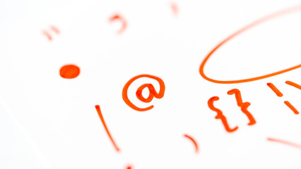 Red Marker Symbols Isolated on White Background. Miscellaneous red marker signs on white background, plus sign, minus sign, red marker stroke, colon red marker. Photo of handwritten characters.