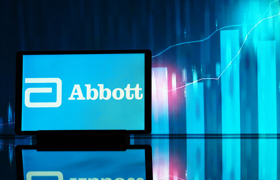 In this photo illustration,  Abbott Laboratories  logo seen displayed on a tablet