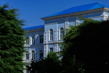 View of buildings and houses in public places in Turkey, sunny summer day