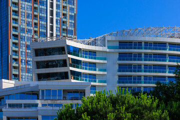View of buildings and houses in public places in Turkey, sunny summer day