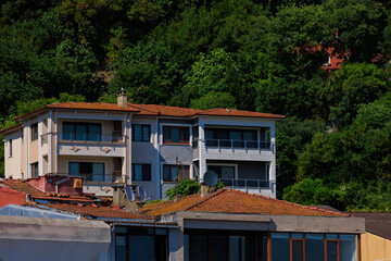 View of buildings and houses in public places in Turkey, sunny summer day