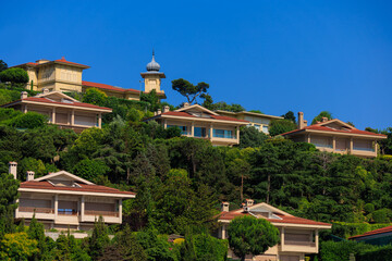 View of buildings and houses in public places in Turkey, sunny summer day