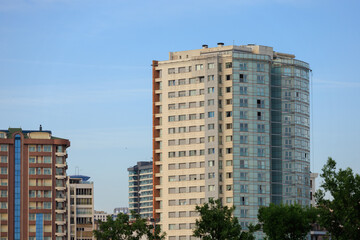 View of buildings and houses in public places in Turkey, sunny summer day