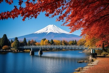 Vibrant autumn colors at lake kawaguchiko with stunning view of mount fuji, japan