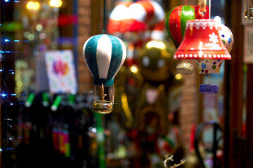 Beautiful toys on the window of a small souvenir store