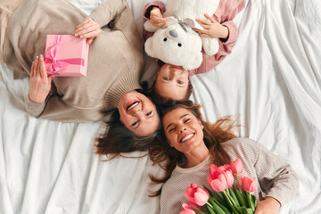 Family at home. Mom daughter and granddaughter at home.