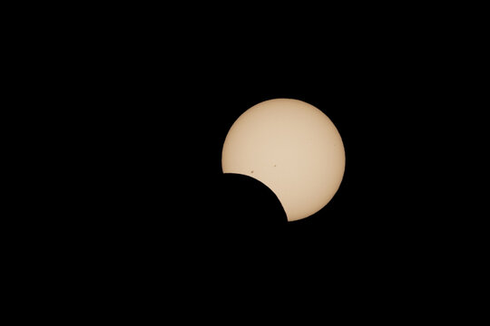 Partial solar eclipse with sun spots captured during the annular solar eclipse in San Antonio, Texas, USA