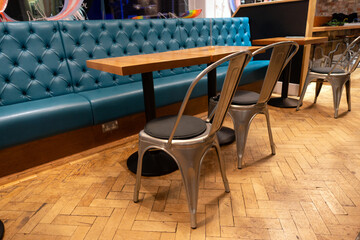 An Empty Closed Cafe with Dining Seats and Table