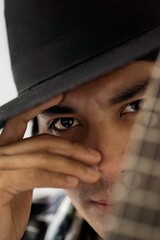 Close up portrait of latin man with the guitar