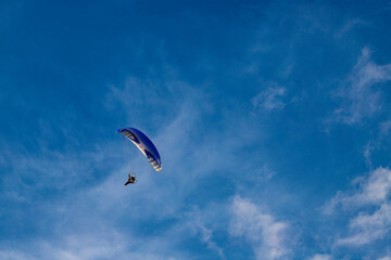 Flying in the sky with a paraglider