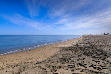 Typical sandy beach of Margherita di Savoia town in Apulia region, southern  Italy.