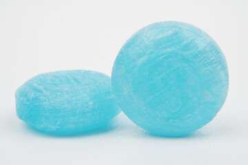 Closeup of two green lozenges concept background