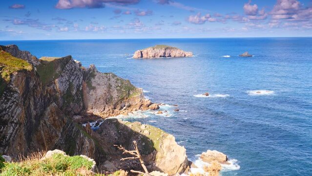 Seascape of Atlantic ocean and Asturias rocky coast at Cape Penas. Sea shore with high cliffs in north Spain.