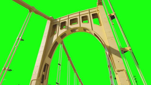 A unique stylized dolly shot view driving over a yellow bridge over the Allegheny River in downtown Pittsburgh, Pennsylvania.  	