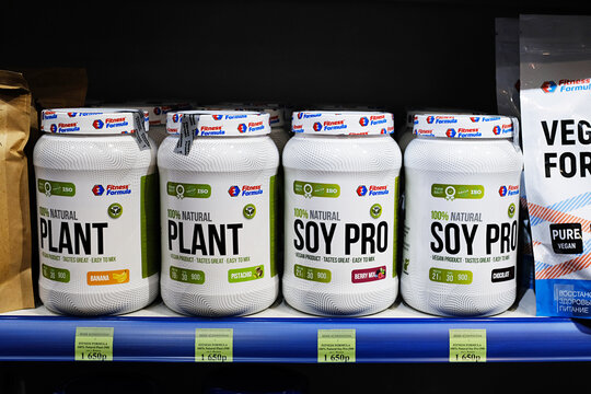 protein dietary supplement on the shelves in the store. selling protein, dietary supplement offline