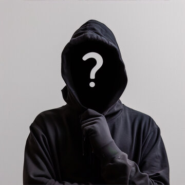 Black hoodie with question mark instead of face on grey background