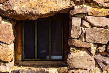 Old stone house with window