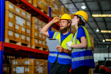 operation workers checking and inspecting cargo for stack items for shipping. males worker checking the store factory. industry factory warehouse. Worker Scanning Package In Warehouse.