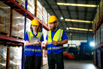 operation workers checking and inspecting cargo for stack items for shipping. males worker checking the store factory. industry factory warehouse. Worker Scanning Package In Warehouse.