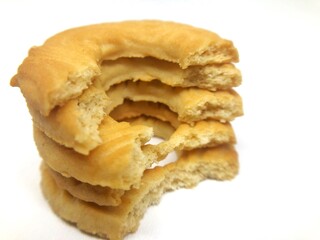round bitten cookies on white background