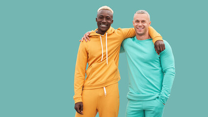 Multi ethnic friends. Two men different color black African-American ethnicity and white Caucasian...
