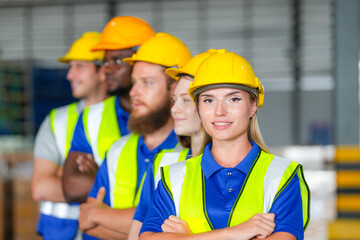 group worker factory men and women standing with confidence and success. people working in workplace of industrial heavy machine factory. young adult in career of industry of technology machinery.