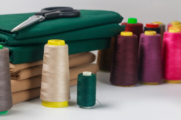 Spools of cotton multicolor thread for sewing machine.