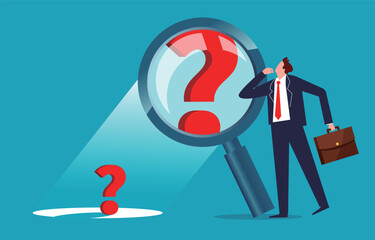 Magnifying question marks, exaggerating difficulties and doubts, problem and cause analysis, the businessman standing next to a magnifying glass looking at a question mark magnified a million times ov