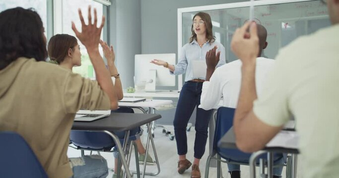 Students, question or answer to lecturer in classroom, biology lesson or anatomy quiz in university. People, diversity or college in learning or education, teaching or hands up to knowledge on campus