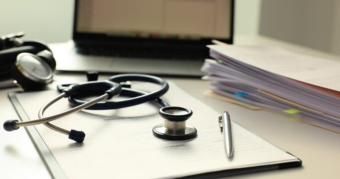 Stethoscope on health insurance documents and individual health insurance