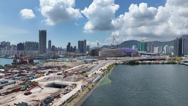 Seaside Commercial residential construction site in Kai Tak Cruise Terminal Hong Kong city, Kwun Tong, and Kowloon Bay near Victoria harbour, Aerial drone Skyview