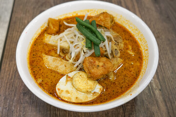 Curry Laksa, a popular traditional spicy noodle soup in Malaysia