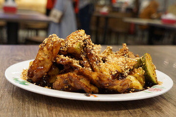 Rojak Petis, a mixed salad lathered with a thick savoury sauce of shrimp paste and crushed peanut. A traditional fruit and vegetable salad dish commonly found in Indonesia, Malaysia and Singapore.