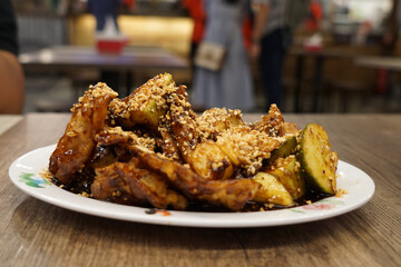 Rojak Petis, a mixed salad lathered with a thick savoury sauce of shrimp paste and crushed peanut. A traditional fruit and vegetable salad dish commonly found in Indonesia, Malaysia and Singapore.