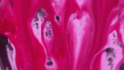 Paint drip. Colorful spill. Defocused creative vivid pink purple black pigment glitter ink blend...