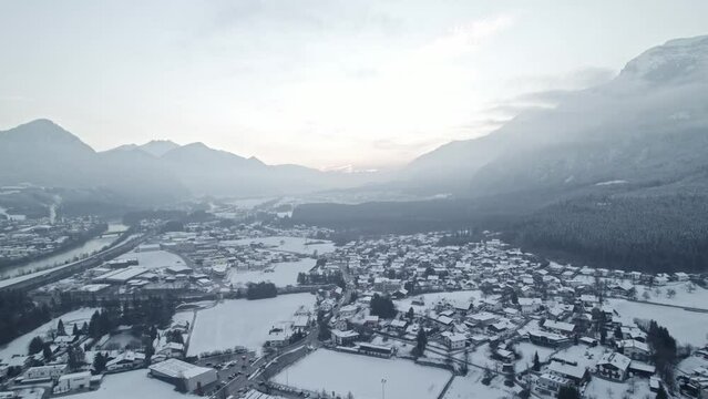 aerial, drone winter, snowy, sunset, austria, valley