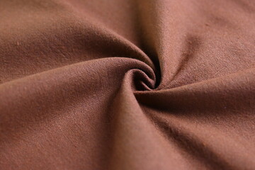 brown cotton texture color of fabric textile industry, abstract image for fashion cloth design...