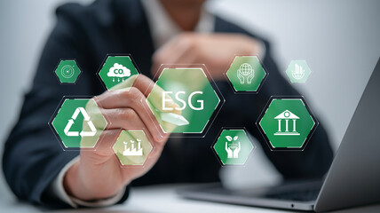 Businessman touch to analyze investment concept.ESG environmental social governance policy for...