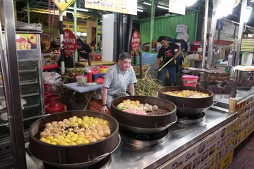 Tuinposter Dimsum/ Dumpling Vendor in Bukit Bintang, Food Market, Kuala Lumpur © sungkono