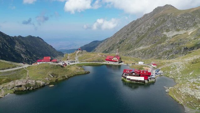 Lake Balea at Transfagarasan, Carpathian Mountains in Transylvania, Romania, Europe - Aerial 4k Circling
