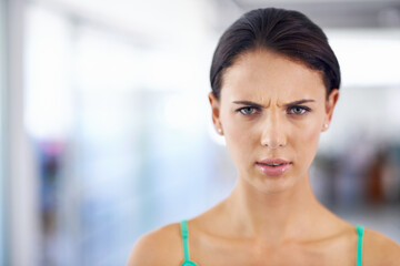 Angry, frustrated and confused portrait of woman with news, announcement or information. Shocked,...